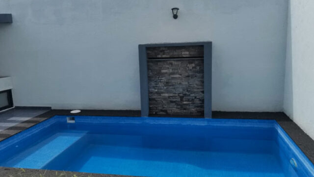 16.-Piscina
